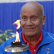 Sri Chinmoy with World Harmony Run torch